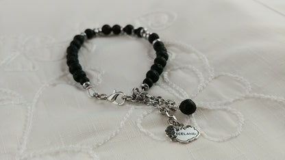 Beaded Hematite and Lava Bracelet with dangling Iceland and Lava Charm - Strung on Wire with Lobster Claw Clasp