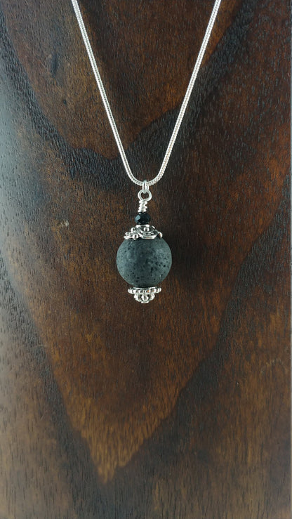 Lava Stone Necklace with Tibetan Silver and Black Glass Bead - 14mm Lava Stone