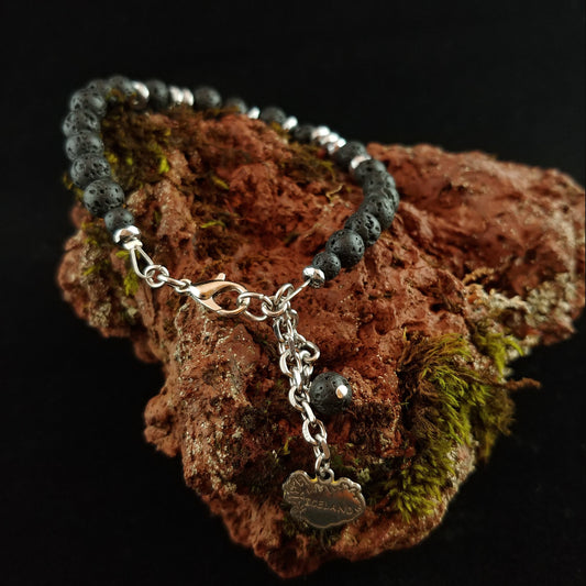 Beaded Hematite bracelet with mix of large and small Lava Rock beads and a Iceland Charm
